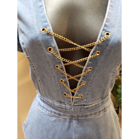 Fashion Nova Denim Jumpsuit Womens Medium Blue Plunging Neck Crisscross Front - Picture 16 of 16